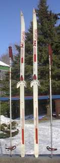 The skis are signed TECNO. Measures 61 (160 cm) long. Have 3 pin 75 