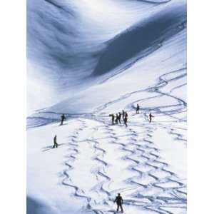 Skiers Getting Fresh Tracks, Wengen, Switzerland, Europe Photographic 