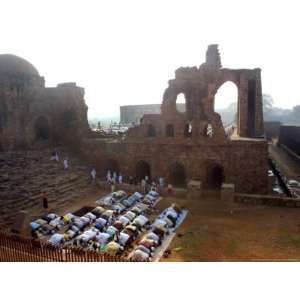  Muslims Offer Eid Prayers at the Ruins of Jami Mosque 