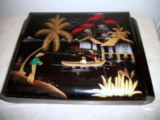 THIS IS AN ORIENTAL STYLE VANITY BOX THAT HAS A MIRROW ON THE INSIDE 