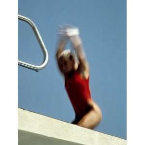 Blurred Action of Female Diver Taking Off from the 10 Meter Platform 