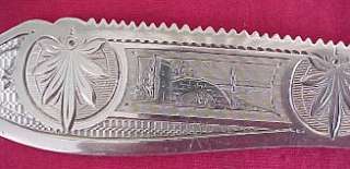 COIN Silver CAKE SAW, TWIST HANDLE, ENGRAVED SCENE  