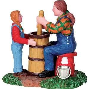  2010 Coventry Cove Churning Butter Village Figure