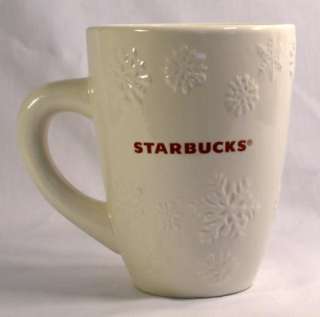This is an Oversized STARBUCKS snowflake coffee/hot chocolate mug.