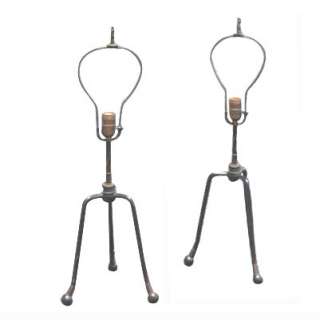   these wrought iron table lamps show off a slim profile inspired by