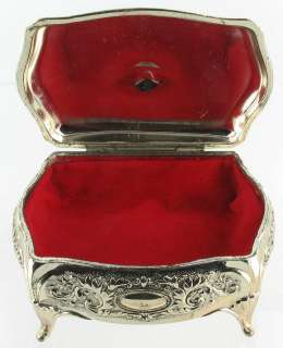   rummaging through Ellis Antiques jewelry box by visiting our store