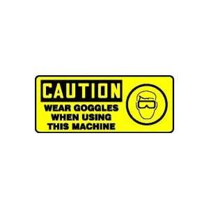 CAUTION WEAR GOGGLES WHEN USING THIS MACHINE (W/GRAPHIC) Sign   7 x 