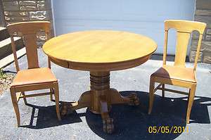 Antique 42 Round Claw footed table with 3 leaves. Six chairs. Great 