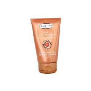 Clarins by Clarins Self Tanning Milk SPF 6  /4.2OZ Beauty