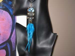 FLY HIGH with long owl feather earrings  