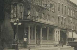 Sharp IOWA IA Anamosa RPPC c.1912 MAIN STREET Looking EAST Hotel 