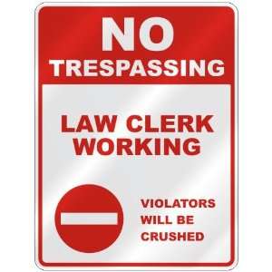 NO TRESPASSING  LAW CLERK WORKING VIOLATORS WILL BE CRUSHED  PARKING 