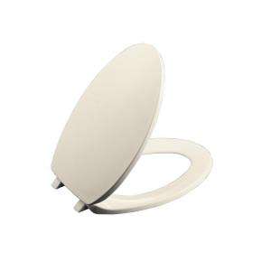 KOHLER Brevia Elongated Closed front Toilet Seat in Almond 