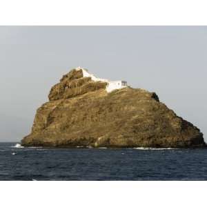 com Lighthouse on Rock in Harbour at Mindelo, Sao Vicente, Cape Verde 