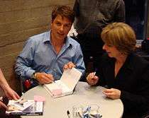 John Barrowman and his sister Carole signing copies of Anything Goes 