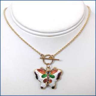 this14k gold filled toggle necklace features a beautiful cloisonne 