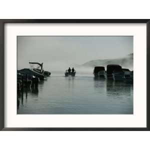  Sport fisherman take their boat out in early morning fog 