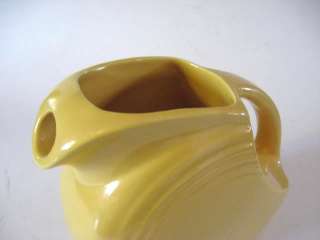 Here we have a beautiful old Fiesta juice pitcher in the bright yellow 