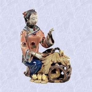   maiden statue tending chicken porcelain sculpture 