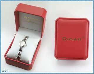   . This watch comes with its own Omax branded red presentation box