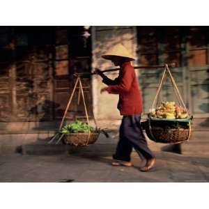 Woman Carrying Fruit and Vegetables, Hoi An, Central Vietnam, Vietnam 